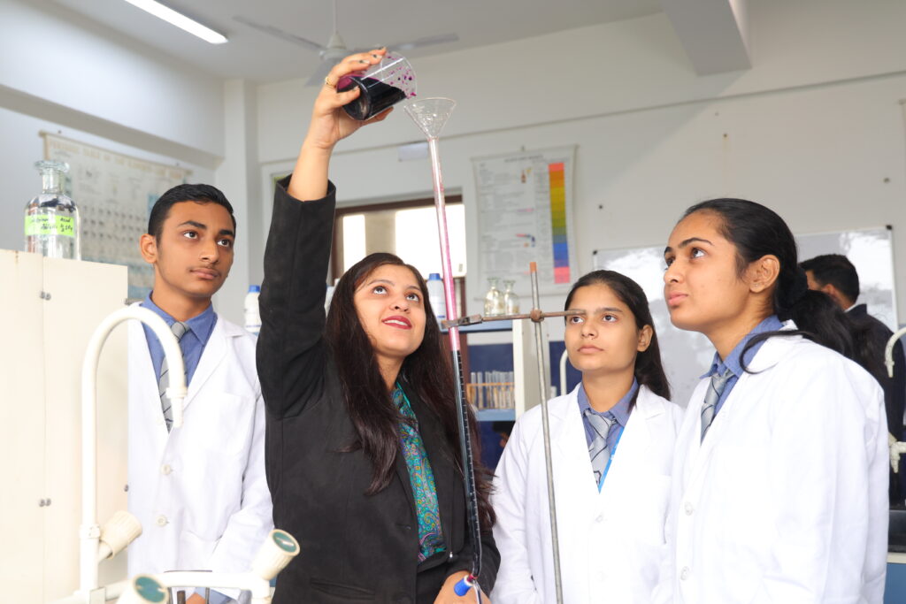 Students conduct a science experiment in a focused lab setting